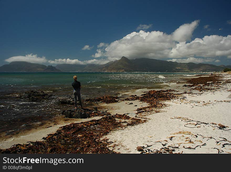 Lone Surfer waiting for new swell, Kommetjie, Cape Town