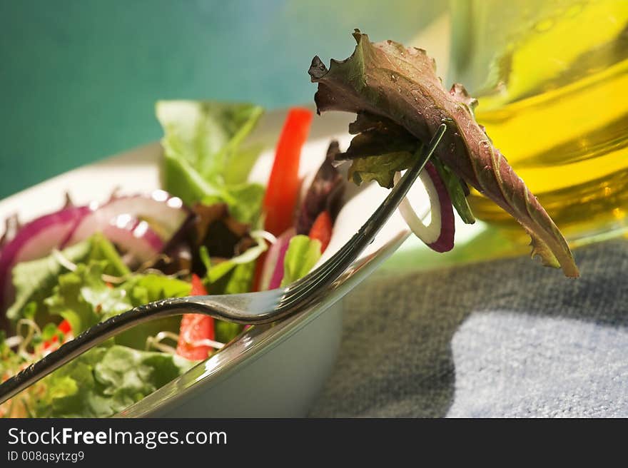 Garden salad on plate with olive oil. Garden salad on plate with olive oil