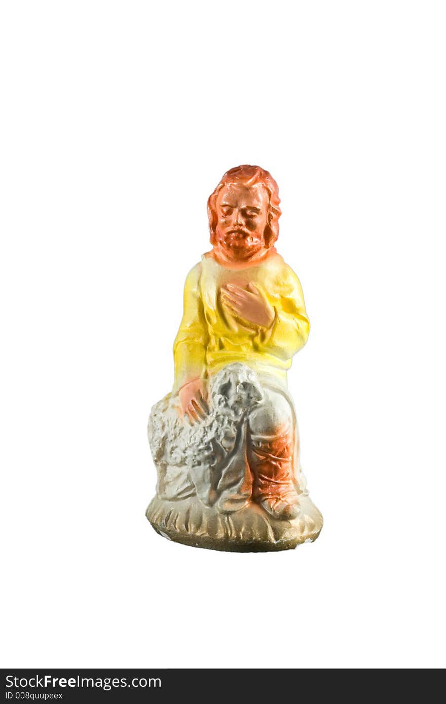 Yellow shepherd figurine from a nativity set. Yellow shepherd figurine from a nativity set