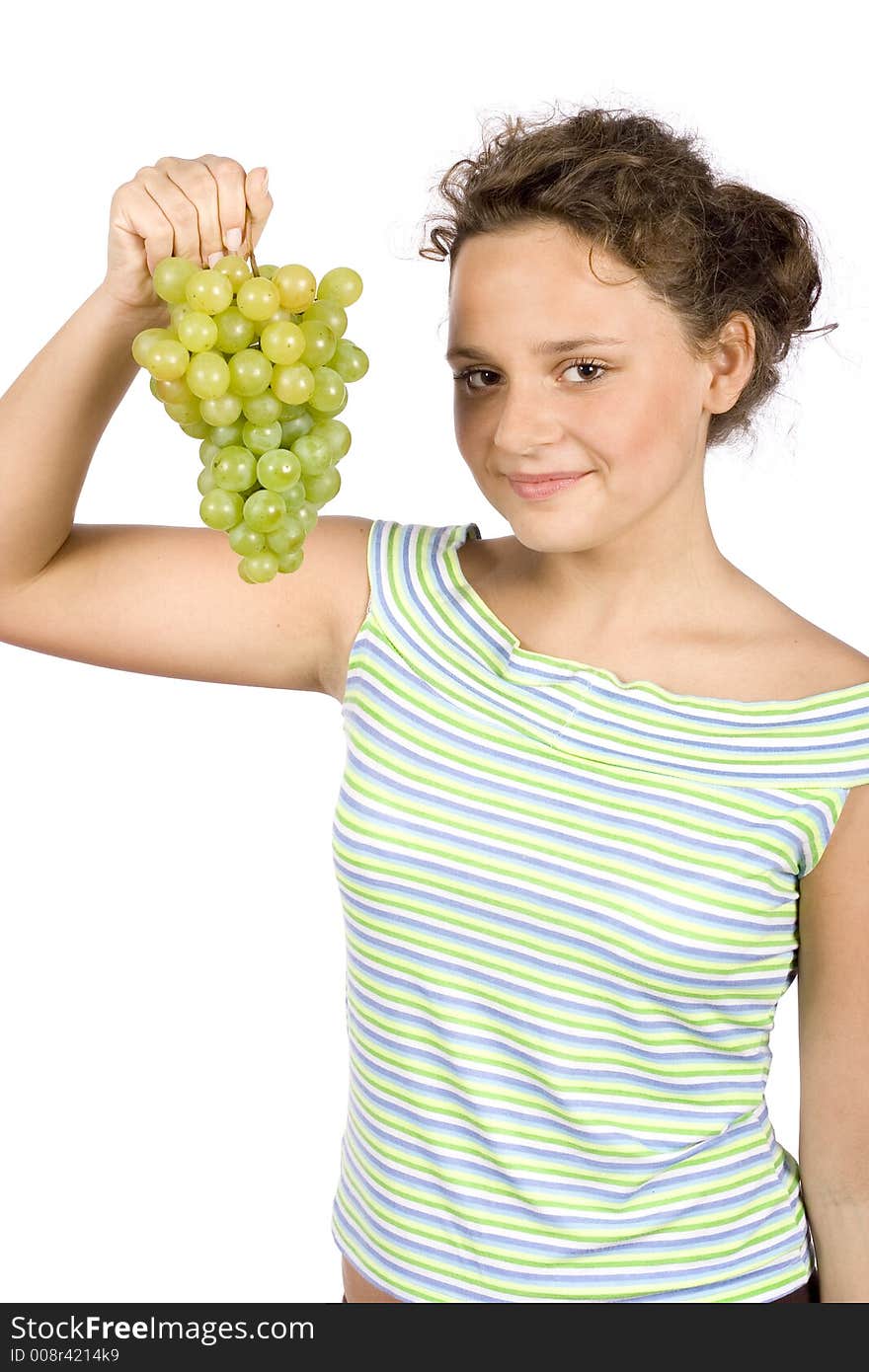 Isolated on white young woman with bunch of grapes