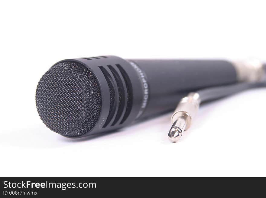 Picture of a microphone with a connection jack. Picture of a microphone with a connection jack