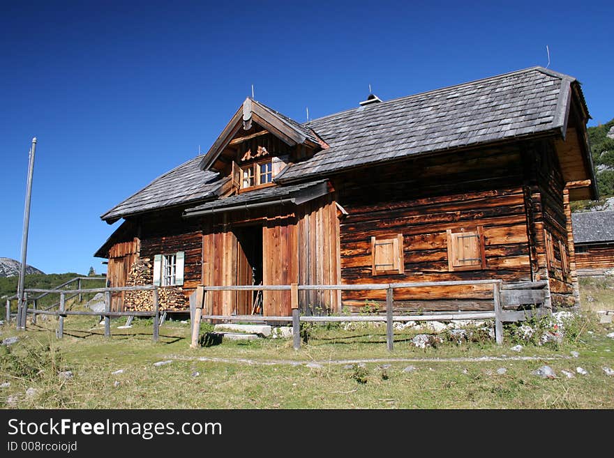 Old log cabin in the mountains