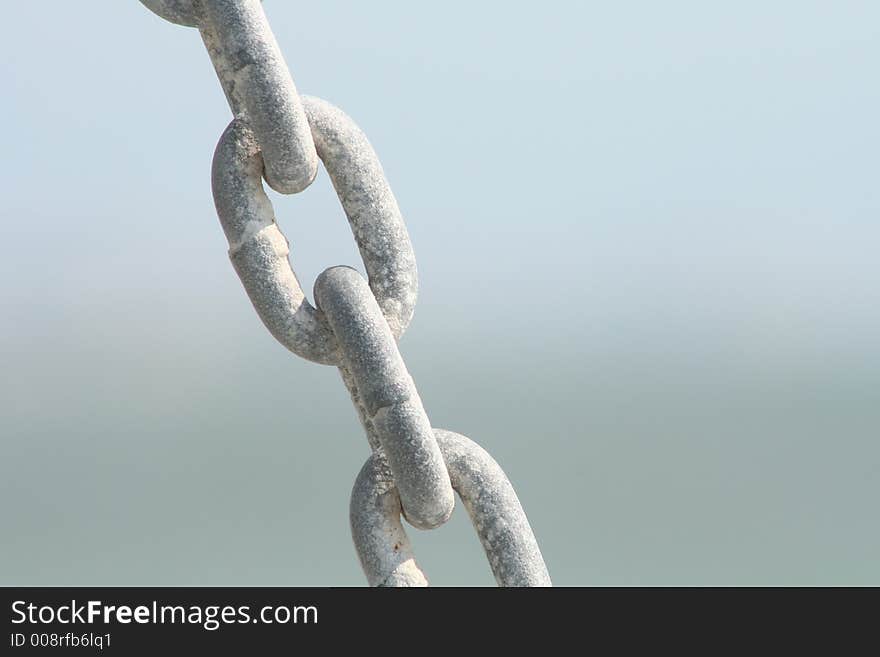 Gray chain in blue background. Gray chain in blue background