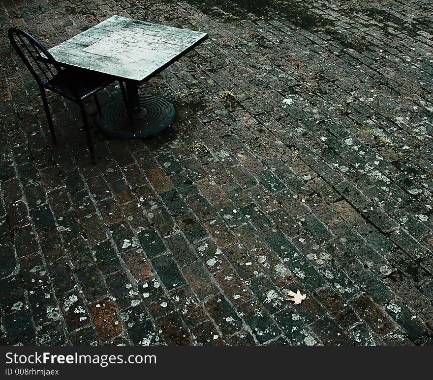 Outdoor table in a brick floor