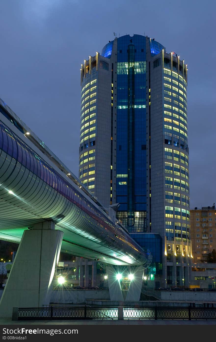 Miscow-City business tower and the pedestrian bridge. Urban illumination. Miscow-City business tower and the pedestrian bridge. Urban illumination