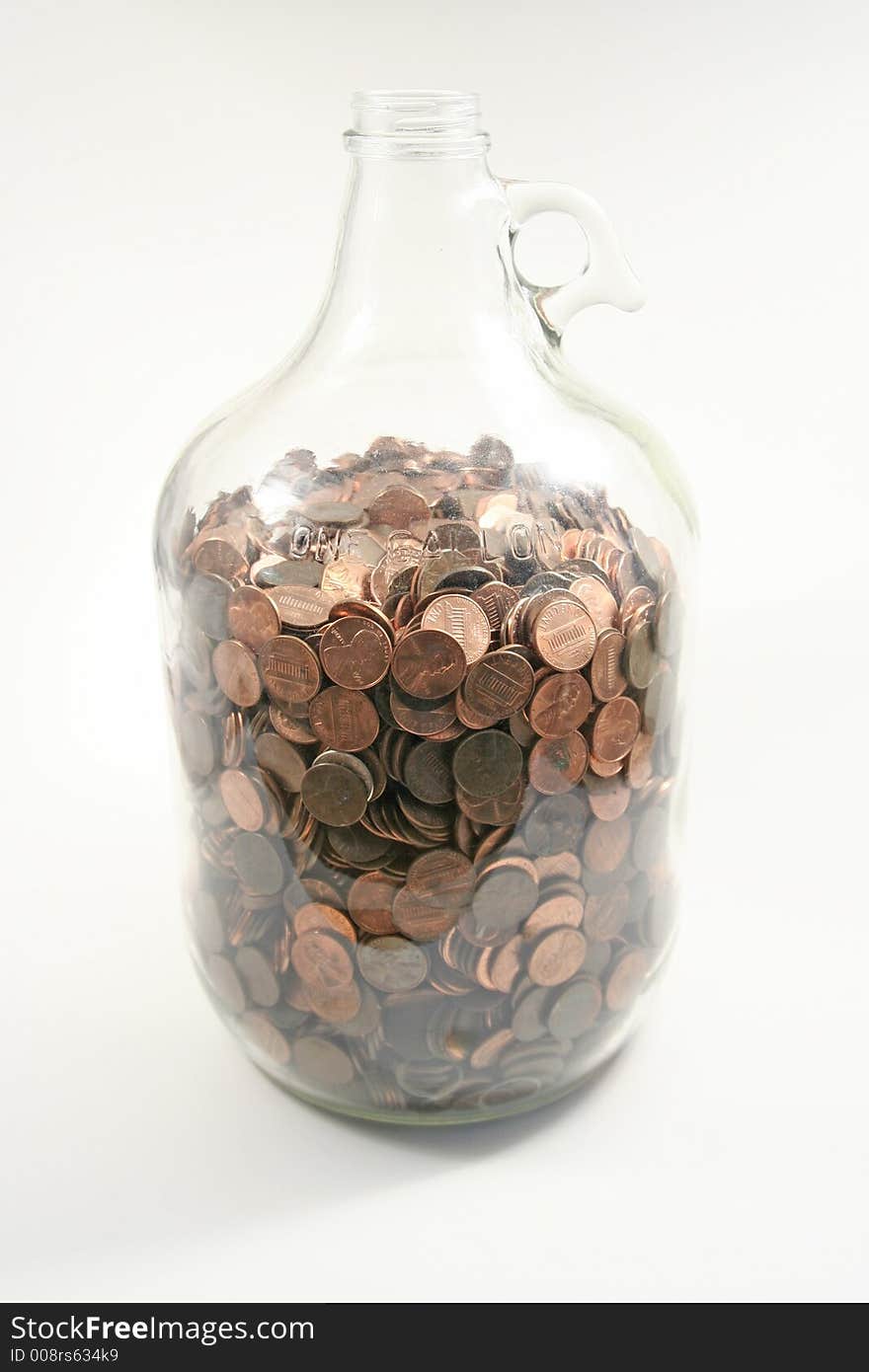 Gallon of pennies in a glass jar