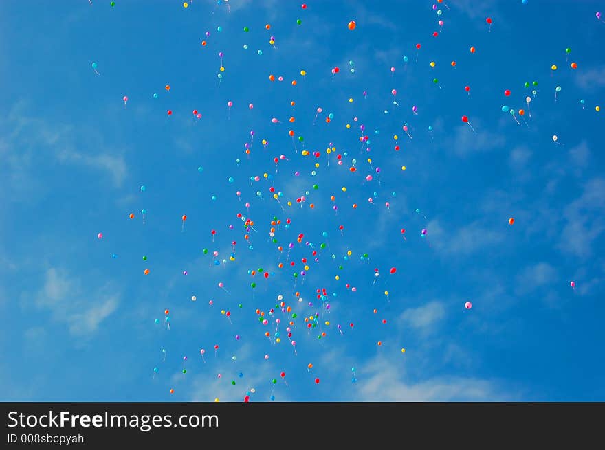 Colorful balloons high in the sky