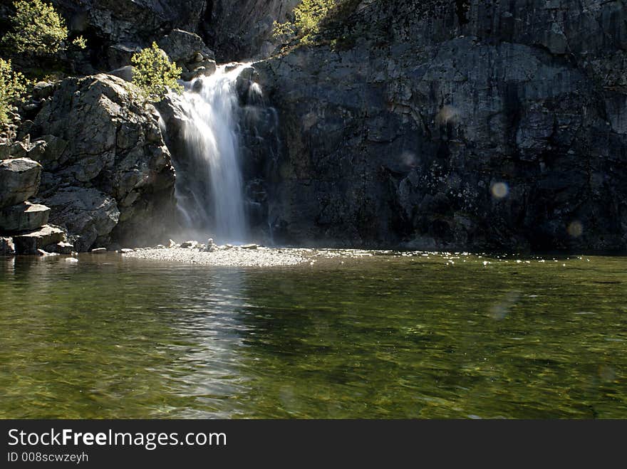 Picture of waterfall from permafrost above Lysefjord in Norway.