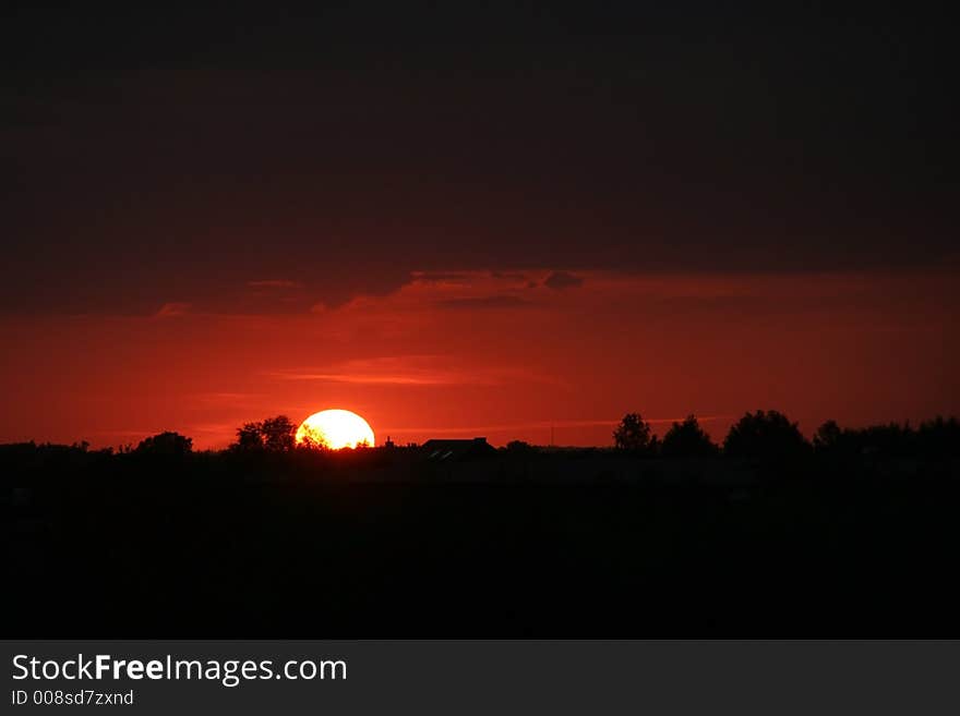 Summer evening sunset; dark background