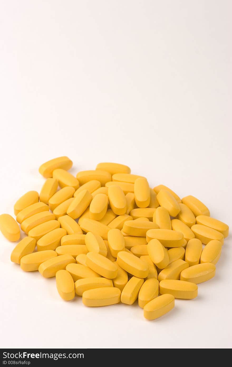 Multiple pills against a white background.