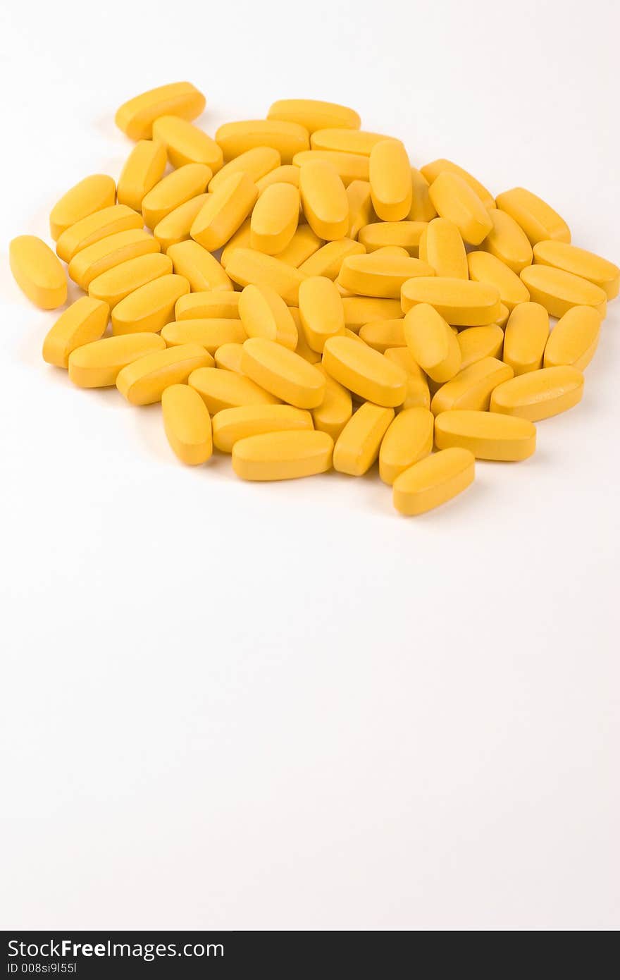 Multiple pills against a white background.