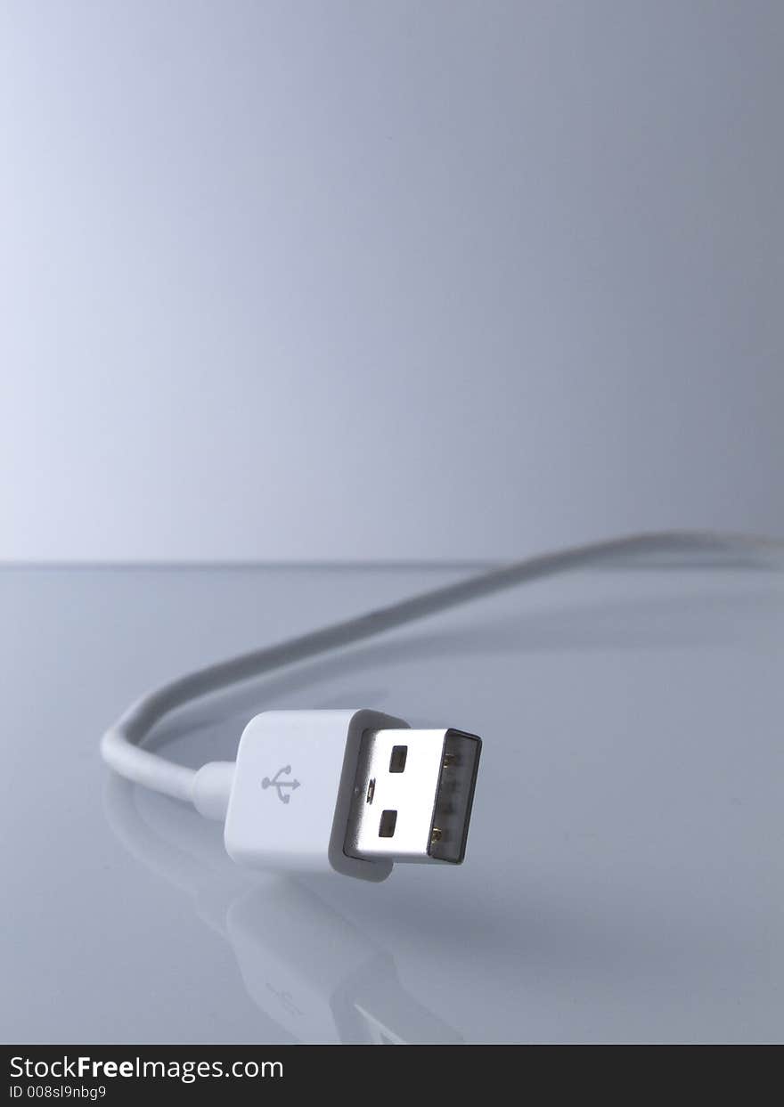 Usb cable on white desk