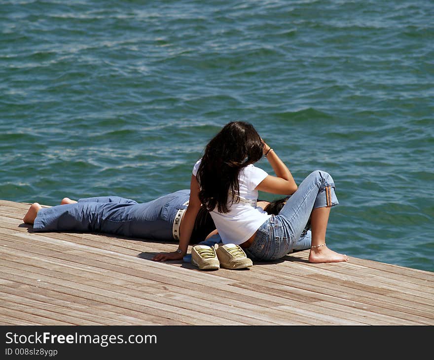 Couple resting close to the sea