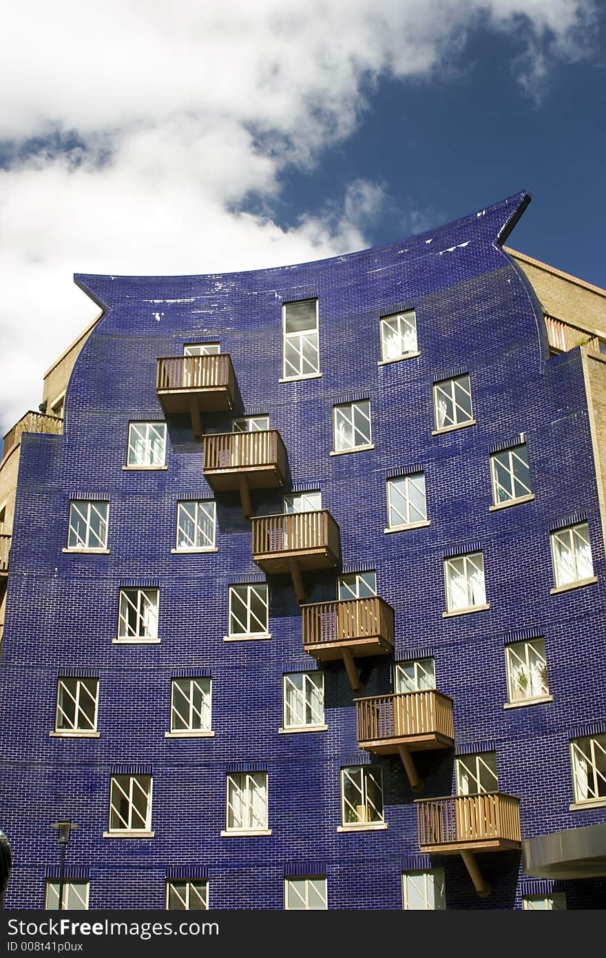 Modern converted warehouse along the river Thames, London.