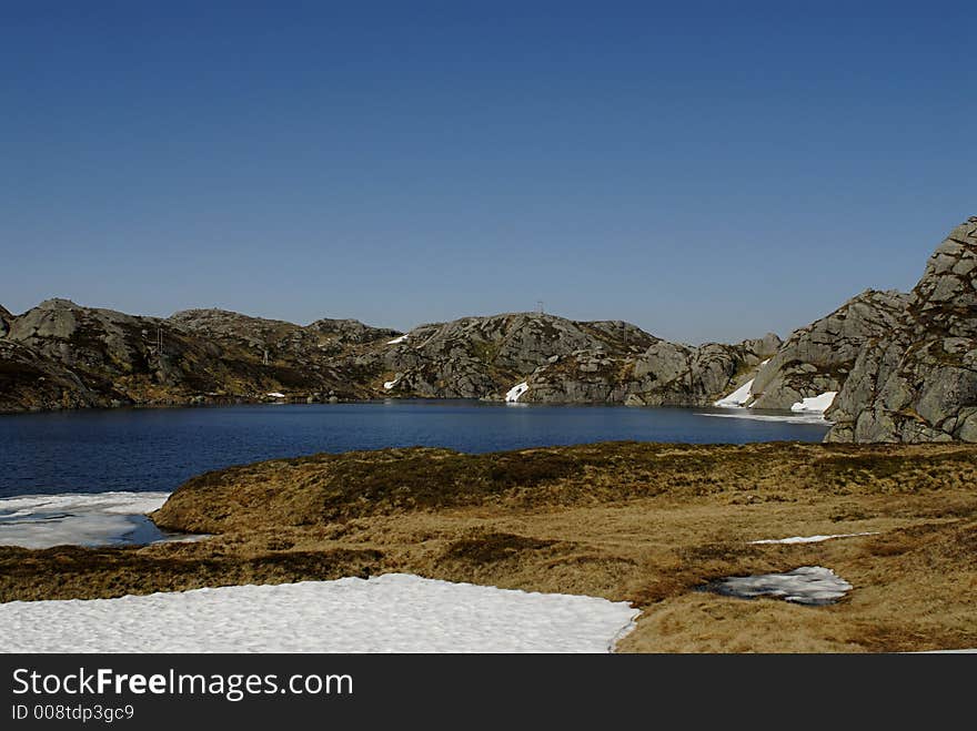 Picture of mountain lake and glaciers in central Norway. Picture of mountain lake and glaciers in central Norway.