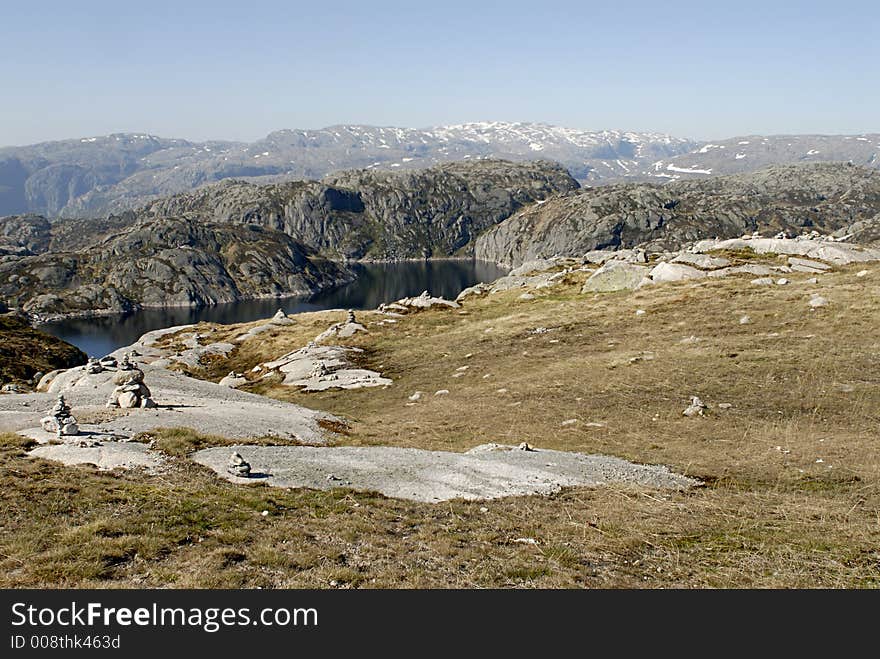 Picture of mountain lake and rocks in central Norway.