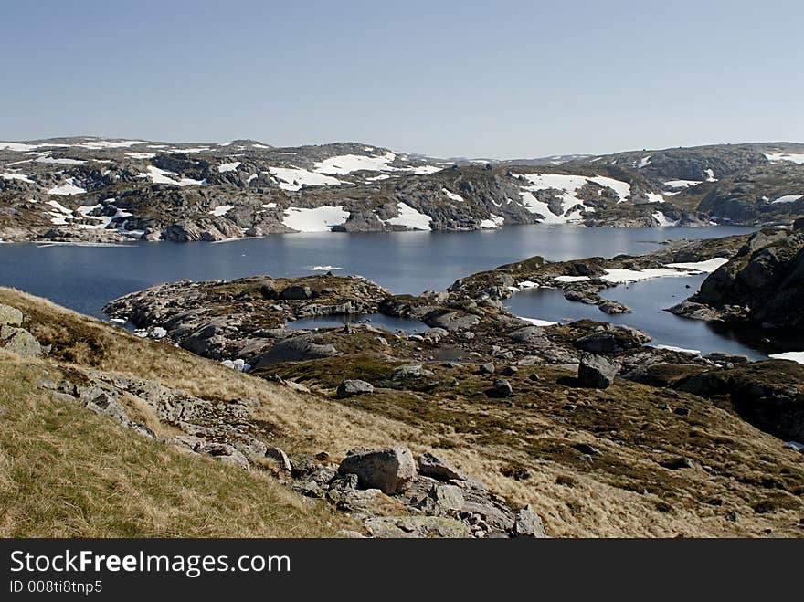 Picture of mountain lake and glaciers in central Norway. Picture of mountain lake and glaciers in central Norway.