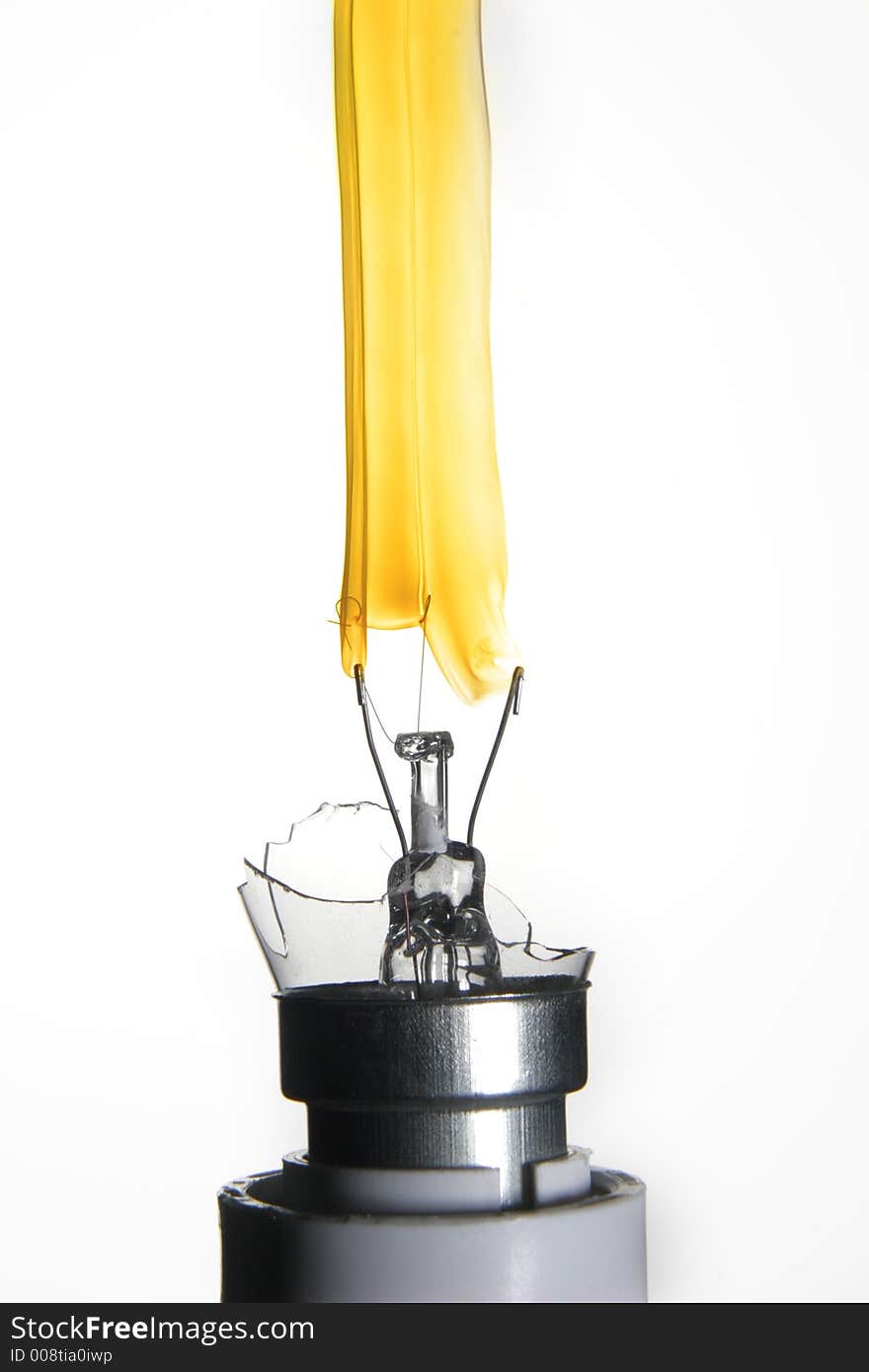 Broken lightbulb on fire against white background. Broken lightbulb on fire against white background