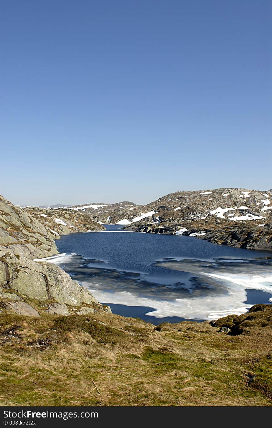 Picture of mountain lake and glaciers in central Norway. Picture of mountain lake and glaciers in central Norway.