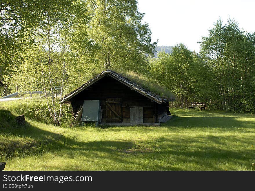 Picture of an old log house in Central Norway. Picture of an old log house in Central Norway.