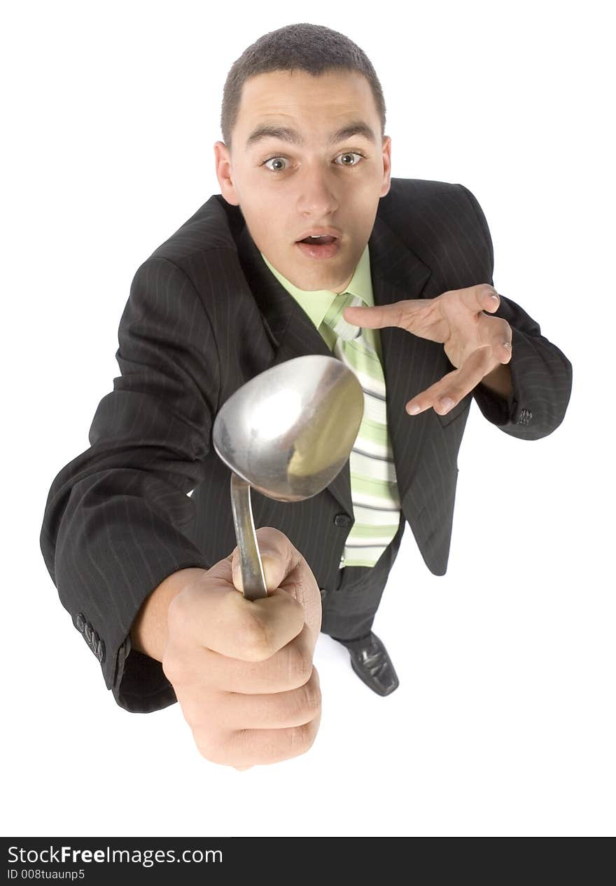 Isolated on white businessman bending spoon by mind force