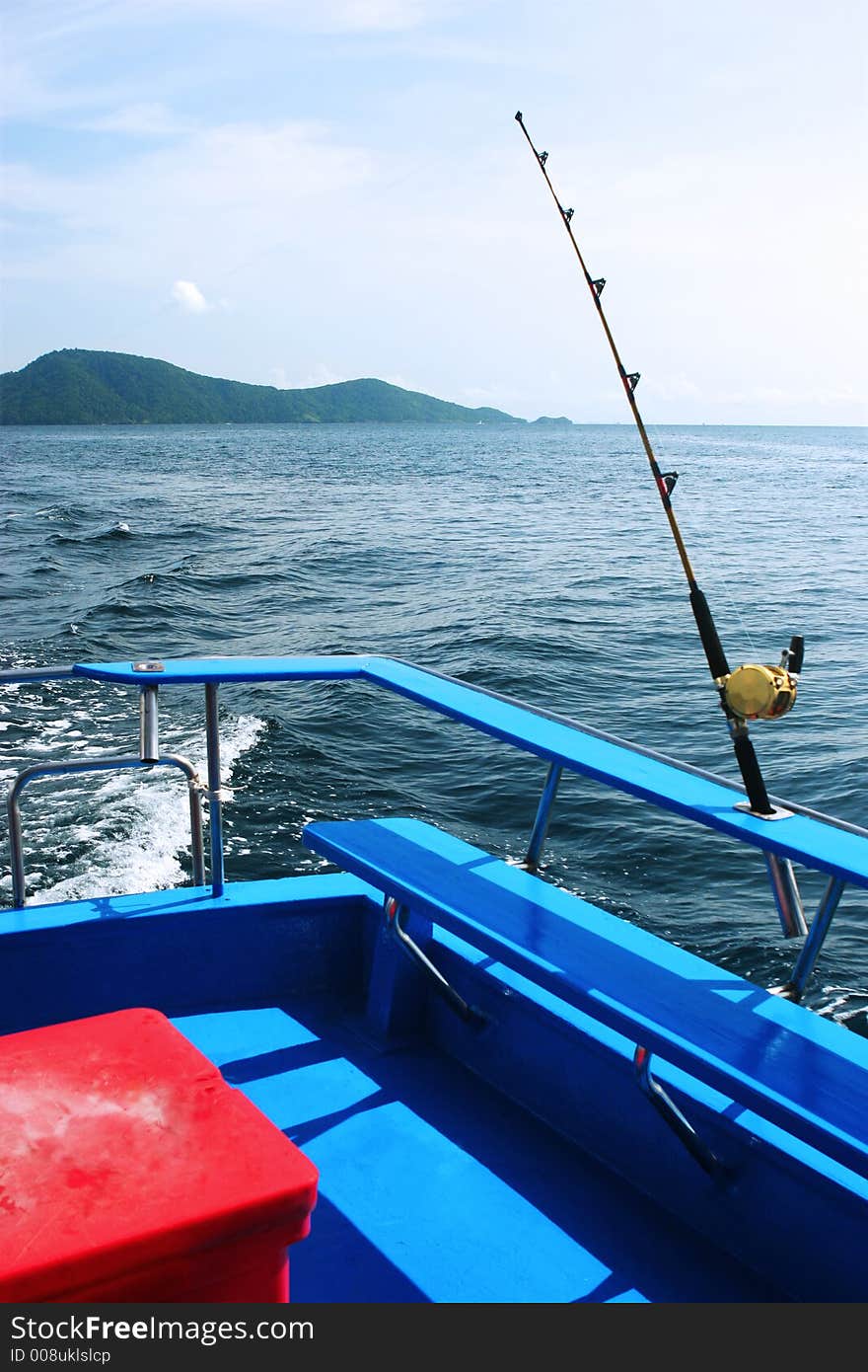 Fishing rod cast off a boat for deep sea fishing. Fishing rod cast off a boat for deep sea fishing