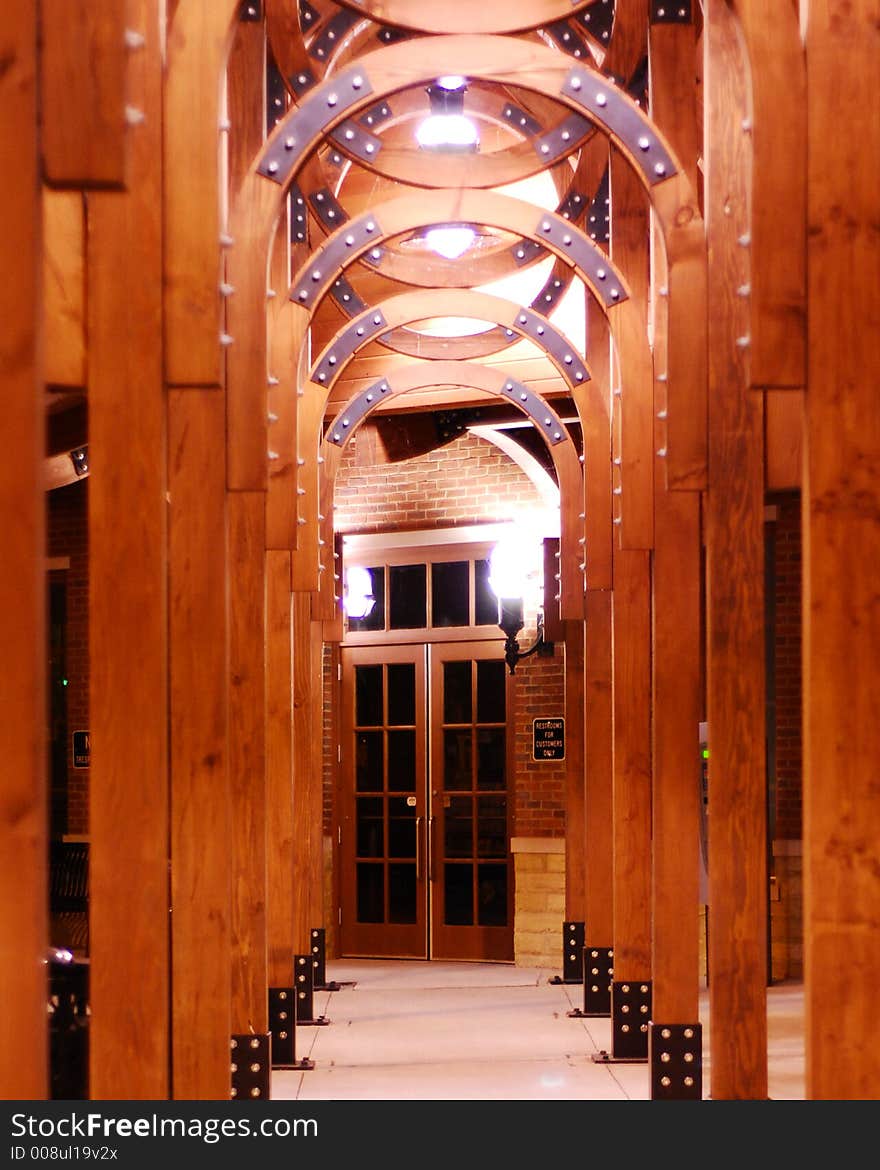 Wood pillars leading to a door