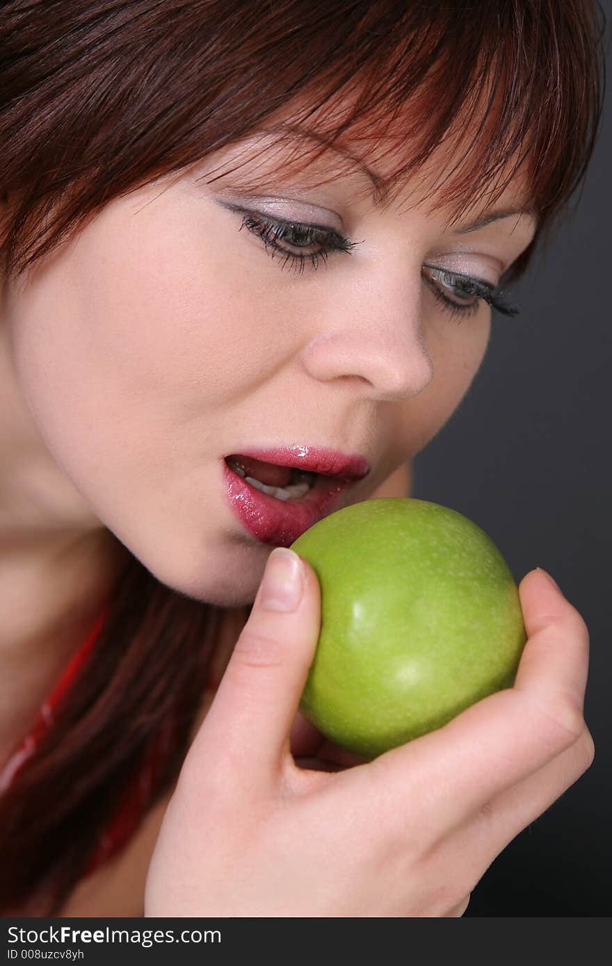 Beautiful girl with green fresh apple. Beautiful girl with green fresh apple