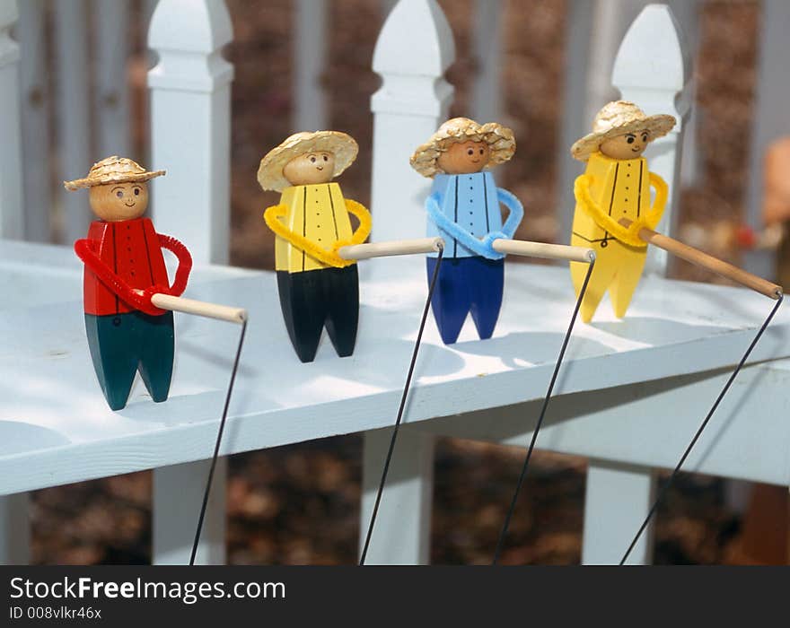 Handcrafted self balancing toy figures fishing