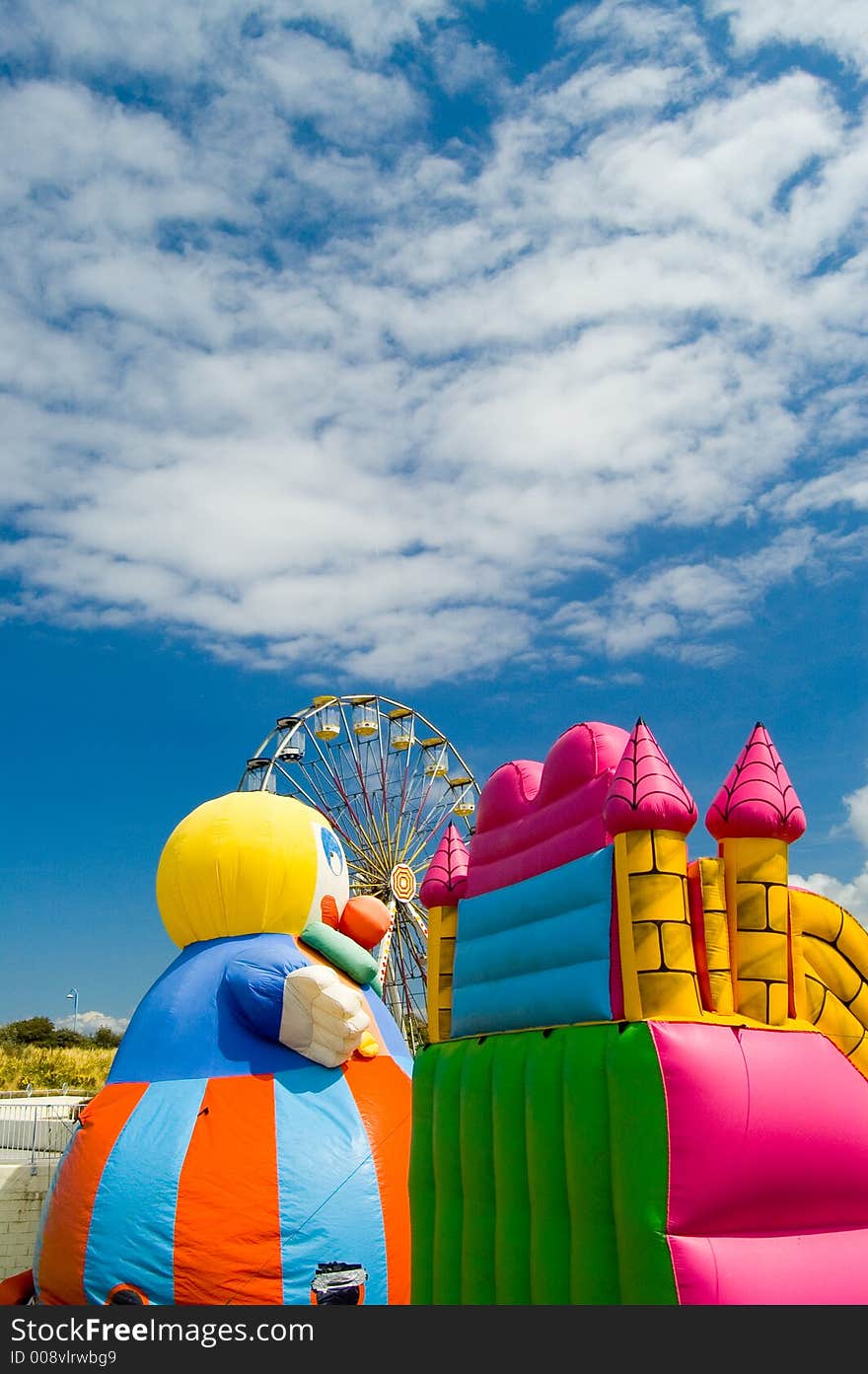 Fairground amusements and clouds