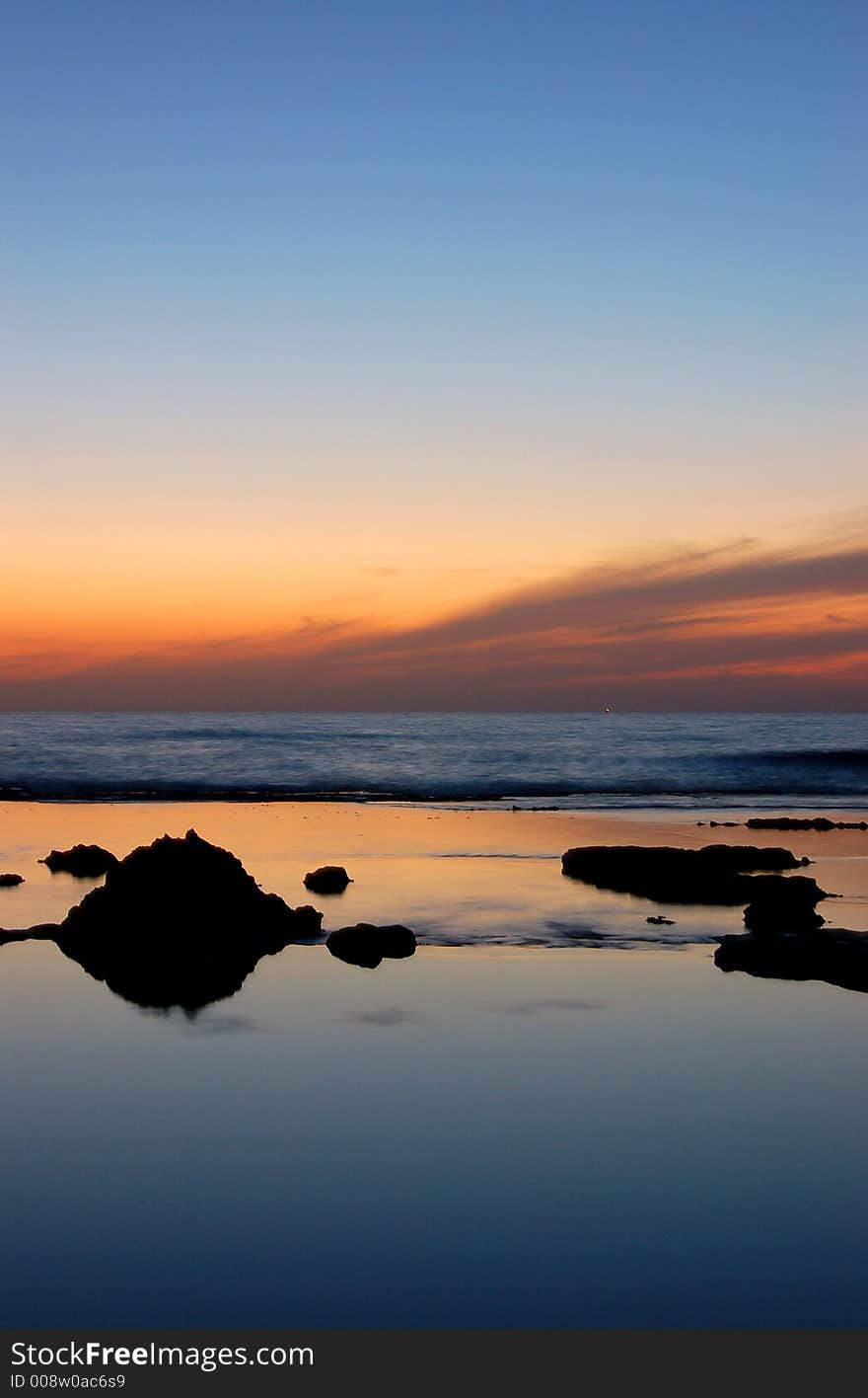 A Beautiful sunset pictured at the beach. A Beautiful sunset pictured at the beach.