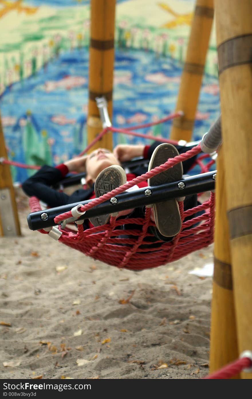 The girl lying in the hammock. The girl lying in the hammock