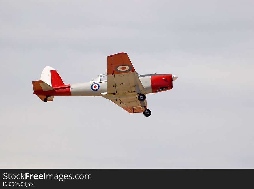 A De Havilland DHC1 Chipmunk flies past during an air show.