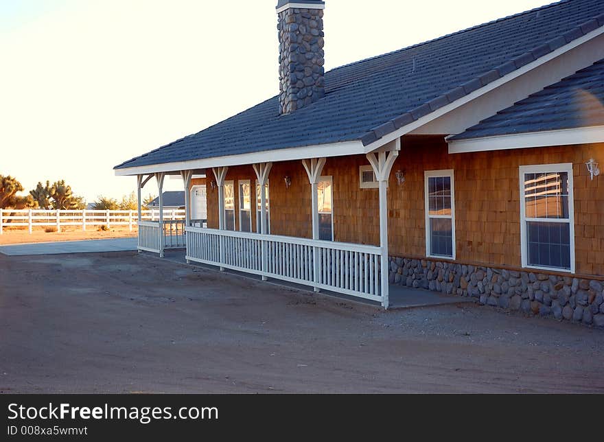 A white with rock ranch house