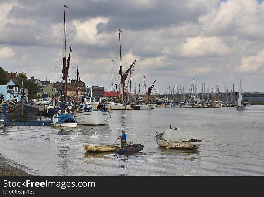 The River Blackwater is located in Maldon, Essex near the east coast of UK. Its populated in this area with old Thames Barges and swans. The River Blackwater is located in Maldon, Essex near the east coast of UK. Its populated in this area with old Thames Barges and swans.