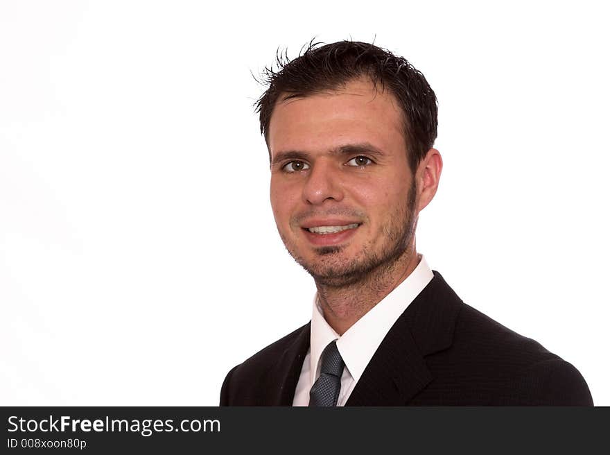 Young businessman smiling at the camera, isolated. Young businessman smiling at the camera, isolated