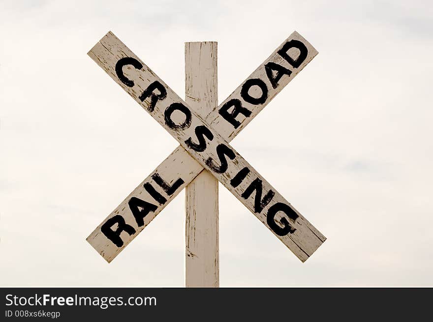 Hand painted railroad crossing sign