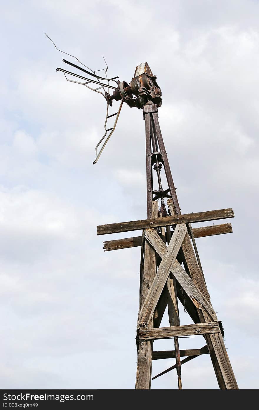 Old windmill at ruins of rural farm. Old windmill at ruins of rural farm