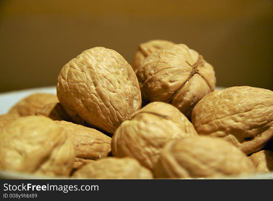 Bowl full of whole walnuts