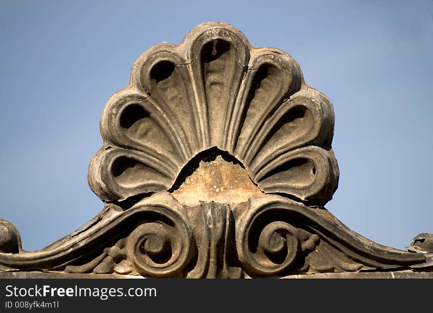 Ornate iron metalwork found in a cemetary. Ornate iron metalwork found in a cemetary