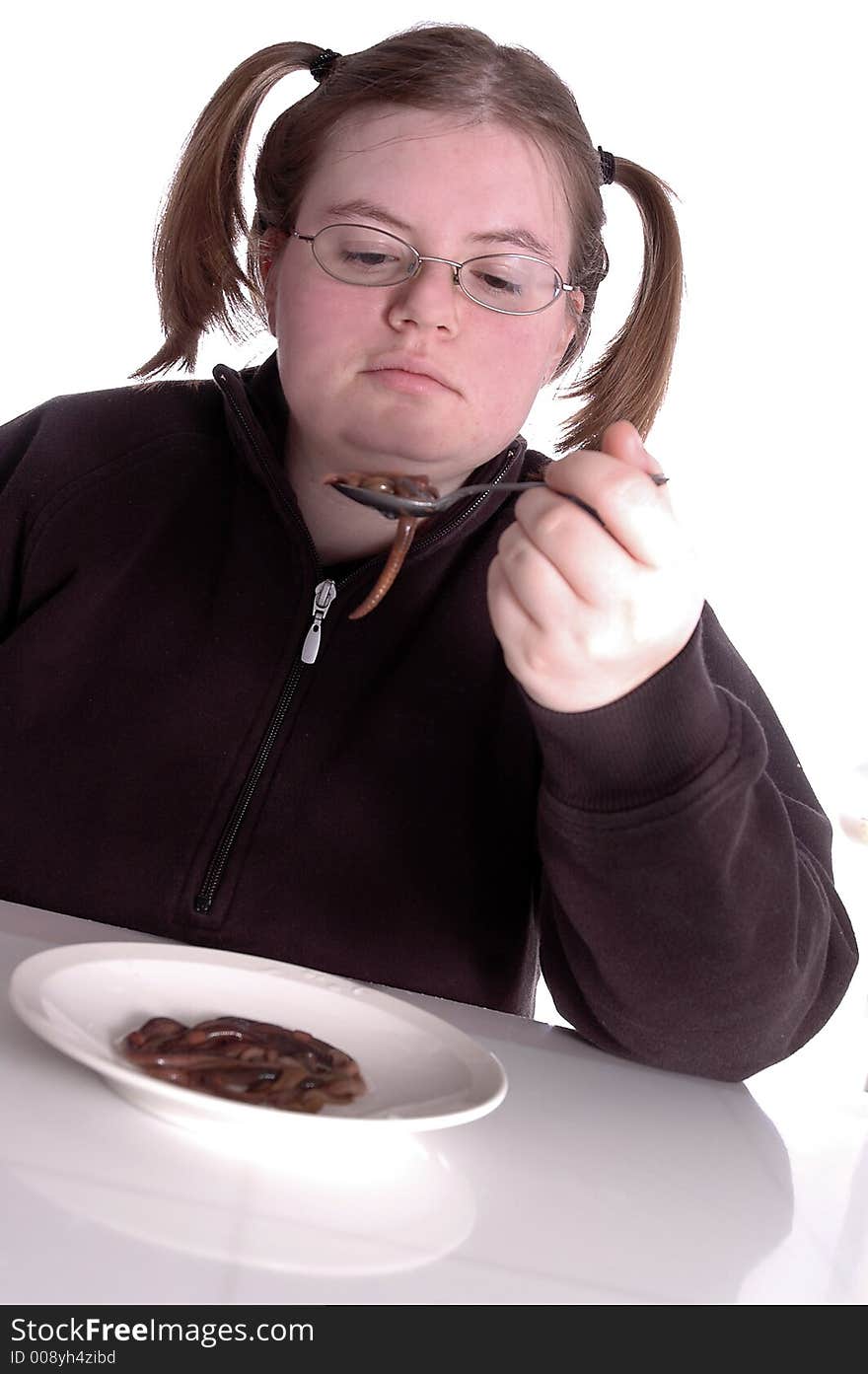 A woman eating worms. White background.