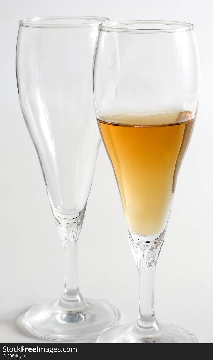 Two wine glass isolated over a white background