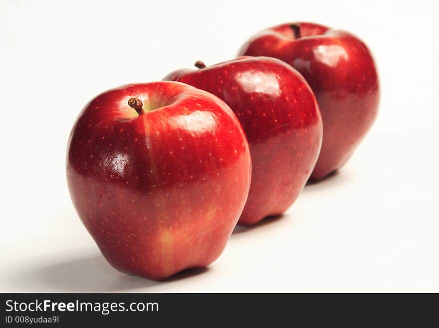 Delicious red apples waiting to be sliced