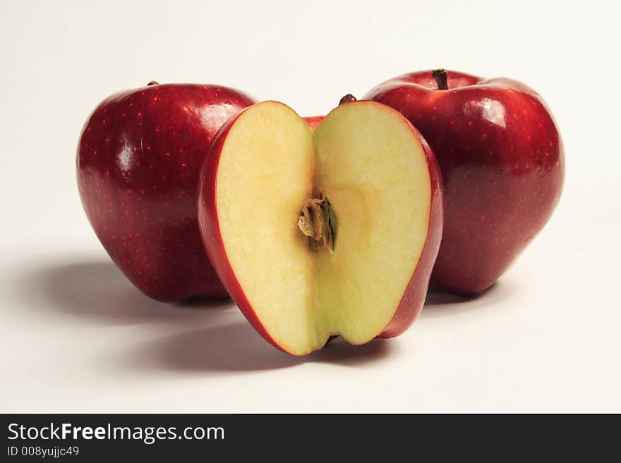 Delicious red apples waiting to be sliced