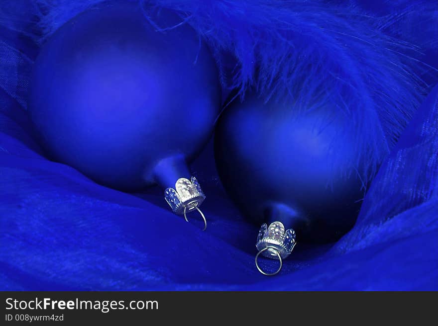 Blue christmas decoration with balls and feather