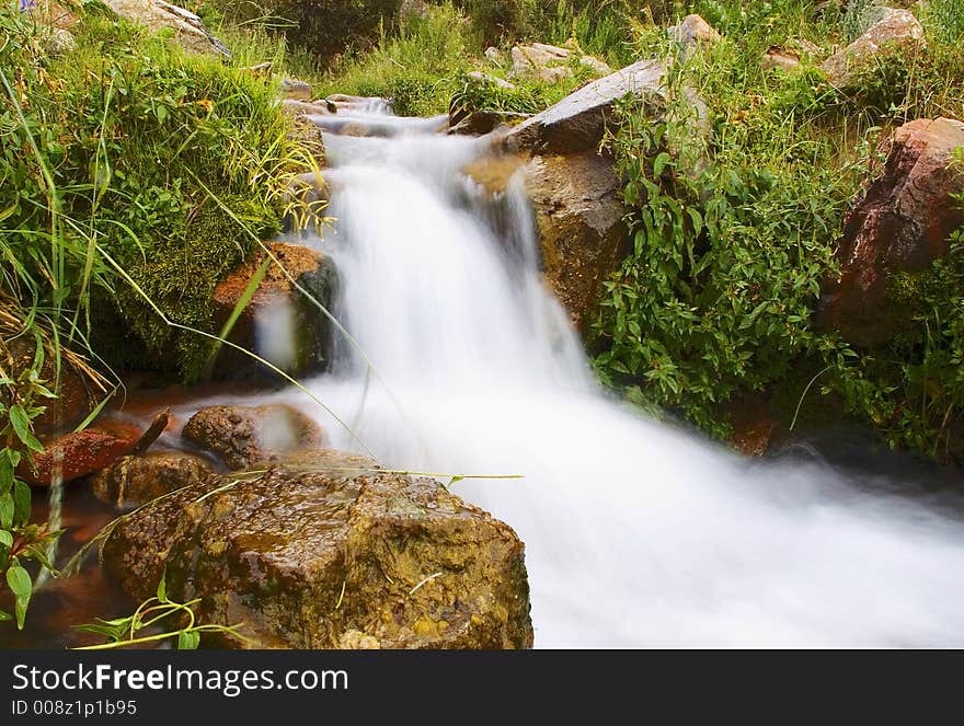 Cascade on mountain range Tan Shan. Cascade on mountain range Tan Shan