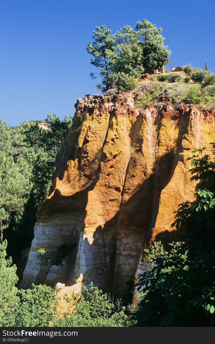 View of ochre clay cliffs of Roussillon in Provence, France