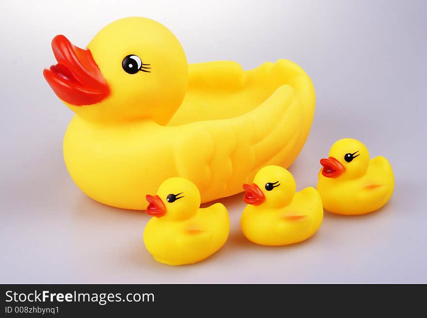 Yellowish rubber duck close up.