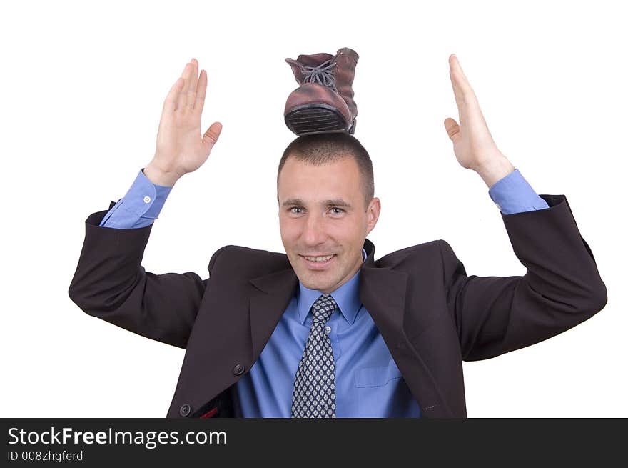 Young business man with a foot on head