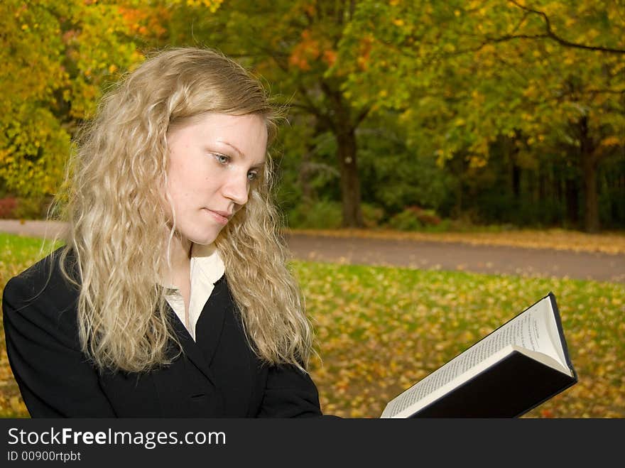 Women reading in the park.